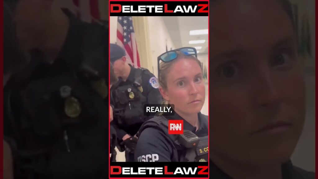 PSYCHO COP STARRING AT AUDITOR FOR FILMING HER!