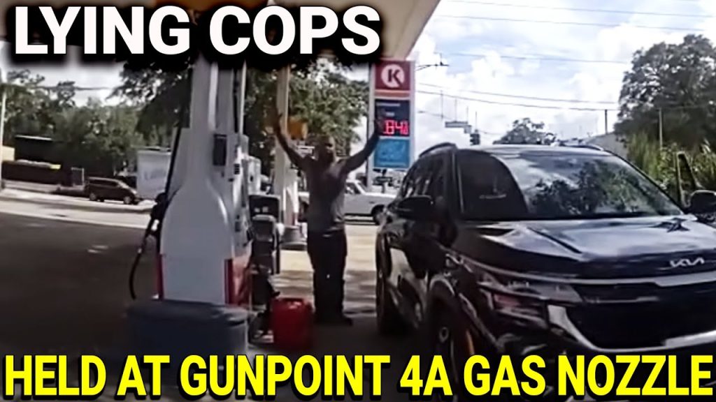 LYING COPS: MAN HELD AT GUN POINT OVER A GAS NOZZLE