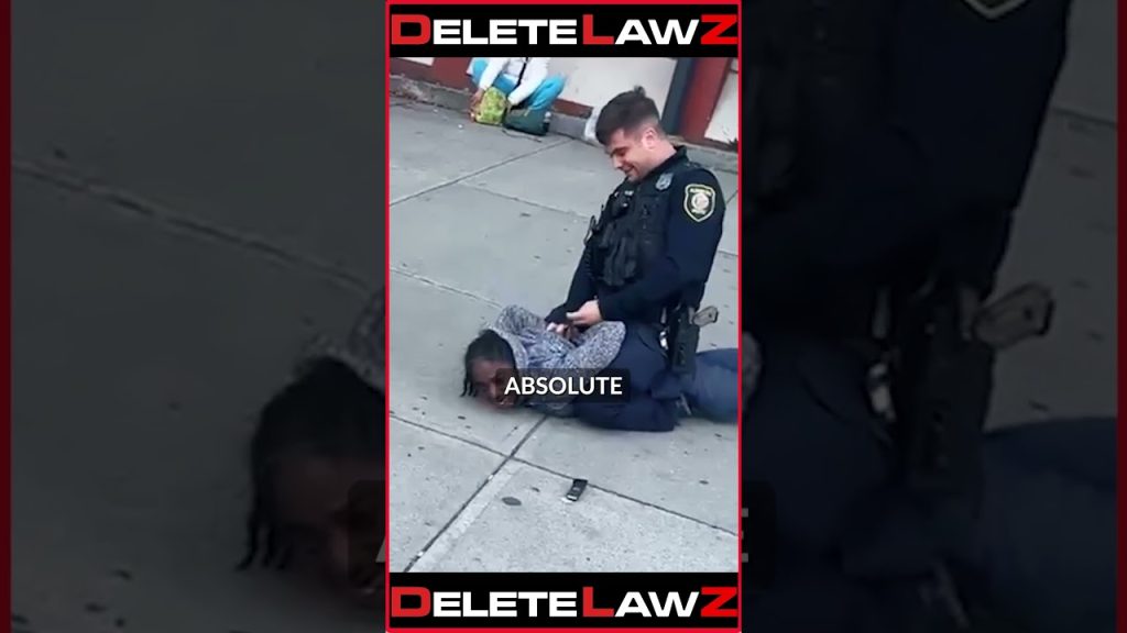 BULLY COP HOLDS WOMAN ON THE GROUND THREATENING HER!