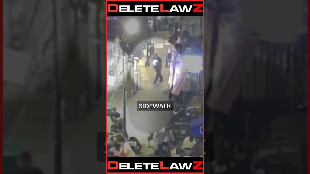 COP OPEN FIRES IN THE MIDDLE OF A CROWD OF PEOPLE!